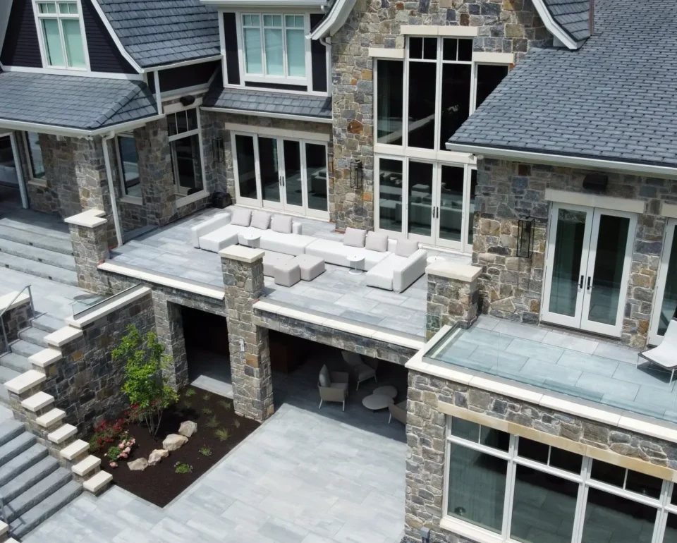 Transforming Outdoor Spaces (Zionsville, Indiana): A Before and After Hardscaping Project by Huser’s Landscaping